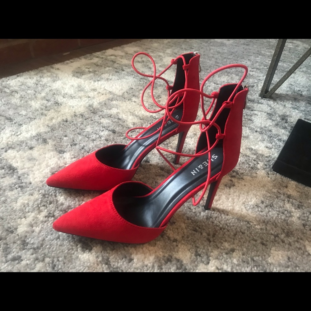 Red strappy heels never worn